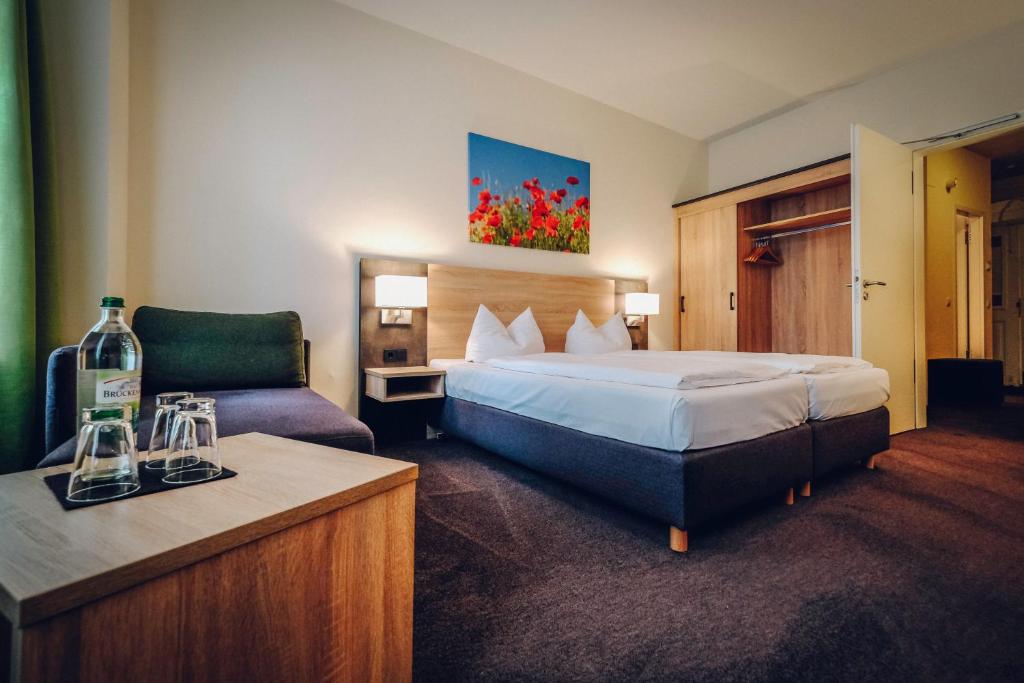 Postel nebo postele na pokoji v ubytování Hotel Europa