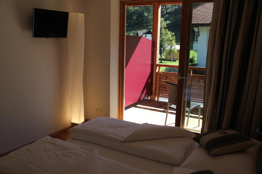 Postel nebo postele na pokoji v ubytování Garni - Hotel Am Burghuegel