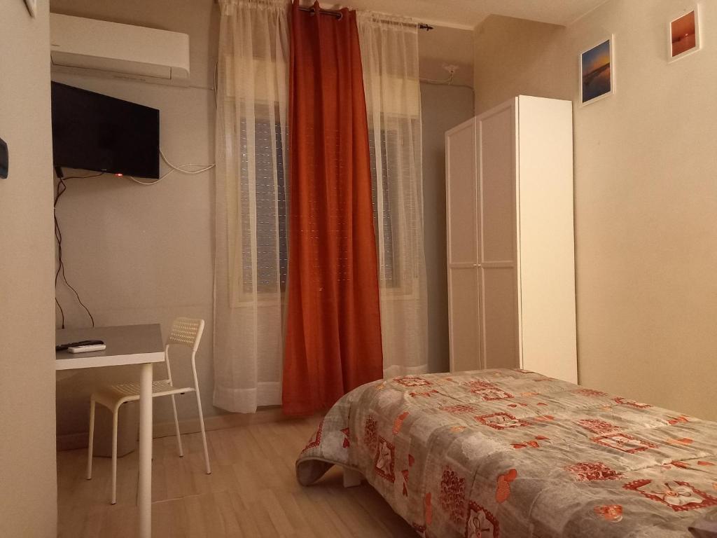 Postel nebo postele na pokoji v ubytování B&B SICILIA