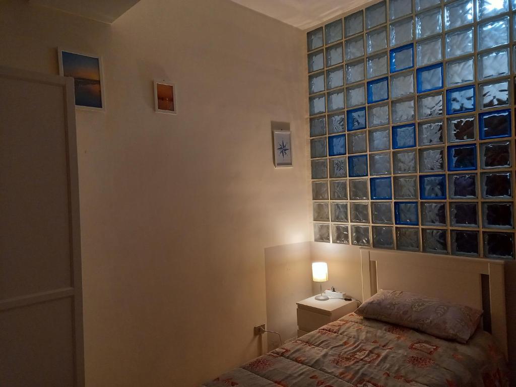 Postel nebo postele na pokoji v ubytování B&B SICILIA