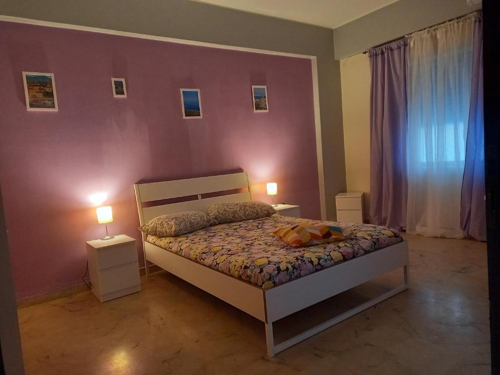 Postel nebo postele na pokoji v ubytování B&B SICILIA