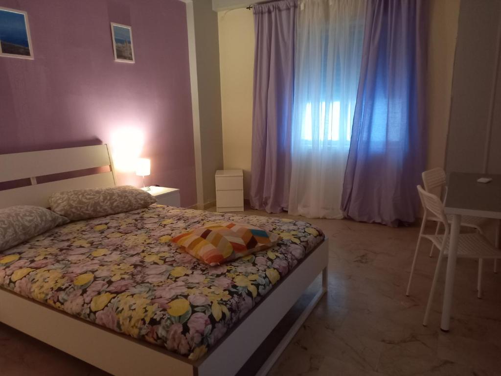 Postel nebo postele na pokoji v ubytování B&B SICILIA