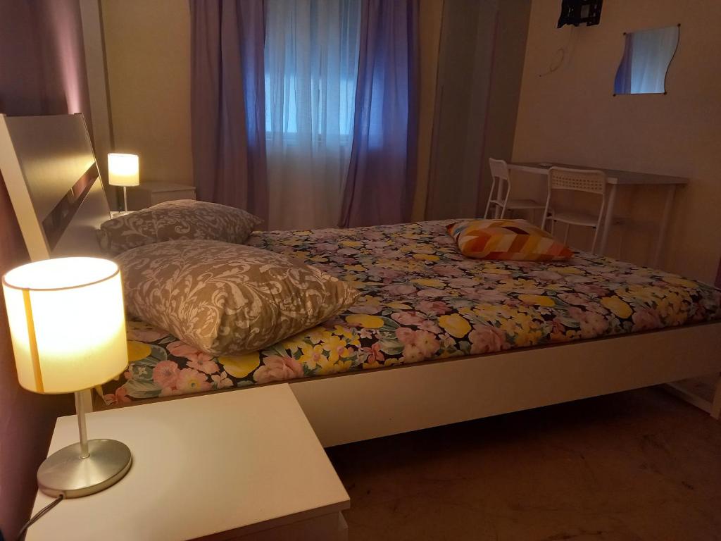 Postel nebo postele na pokoji v ubytování B&B SICILIA