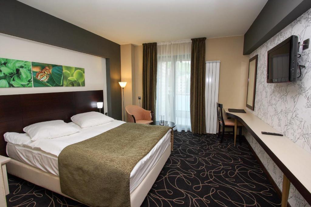 TV a/nebo společenská místnost v ubytování Hotel Orizont