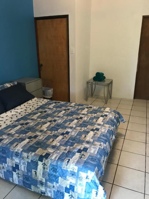 Postel nebo postele na pokoji v ubytování Combate Green House
