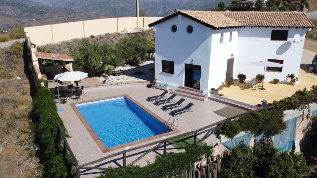 Bazén v ubytování Cortijo Mirador de Almuñecar nebo v jeho okolí