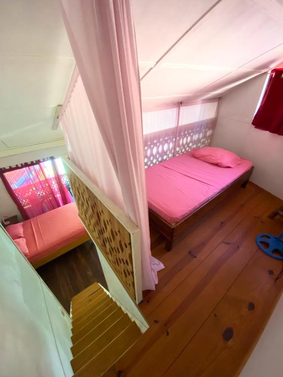 Postel nebo postele na pokoji v ubytování AmimodoBeachRooms