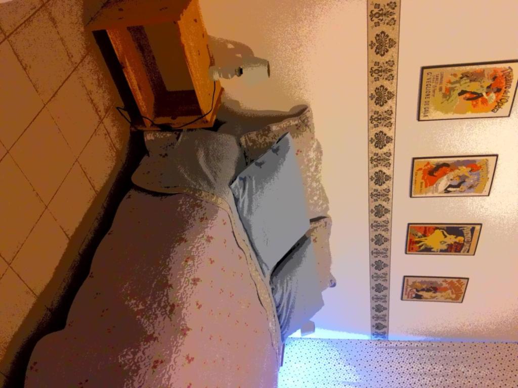 A bed or beds in a room at Su Planu
