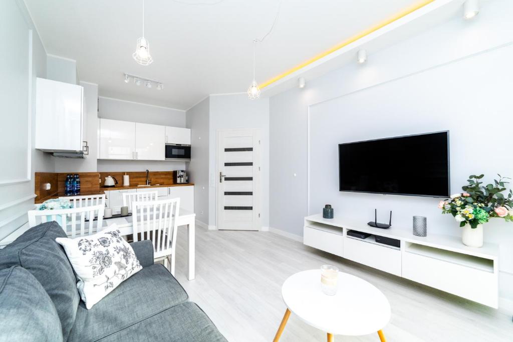 Kuchyňa alebo kuchynka v ubytovaní Bright - Neptun Park by OneApartments