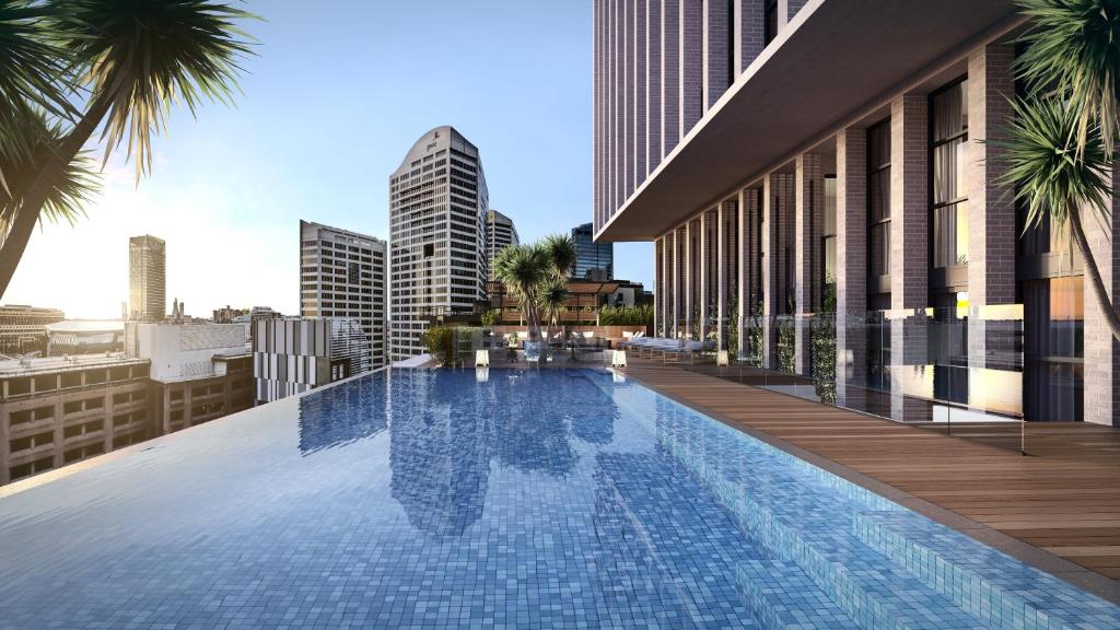 a swimming pool on the roof of a building at Crowne Plaza Sydney Darling Harbour, an IHG Hotel in Sydney