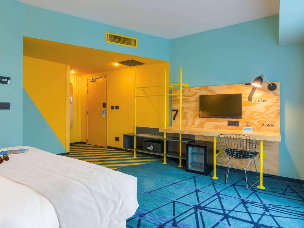 TV a/nebo společenská místnost v ubytování ibis Styles Bucharest Erbas