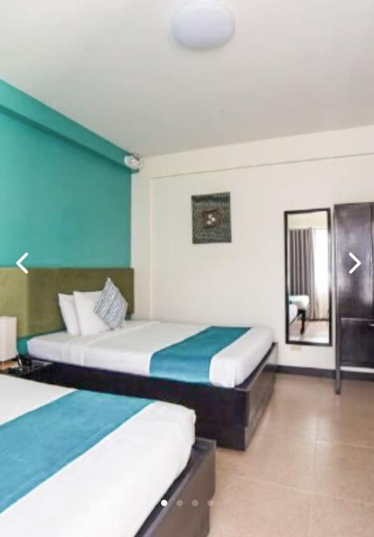 Voodi või voodid majutusasutuse Residencia Boracay toas