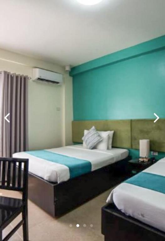 Voodi või voodid majutusasutuse Residencia Boracay toas