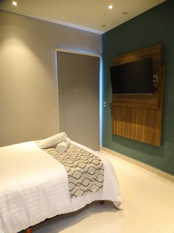 Postel nebo postele na pokoji v ubytování Hotel Luma by Kavia