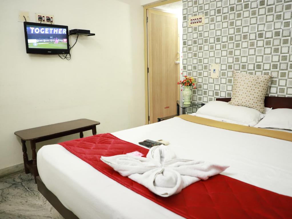 Postel nebo postele na pokoji v ubytování Just Guest House, Chennai Airport