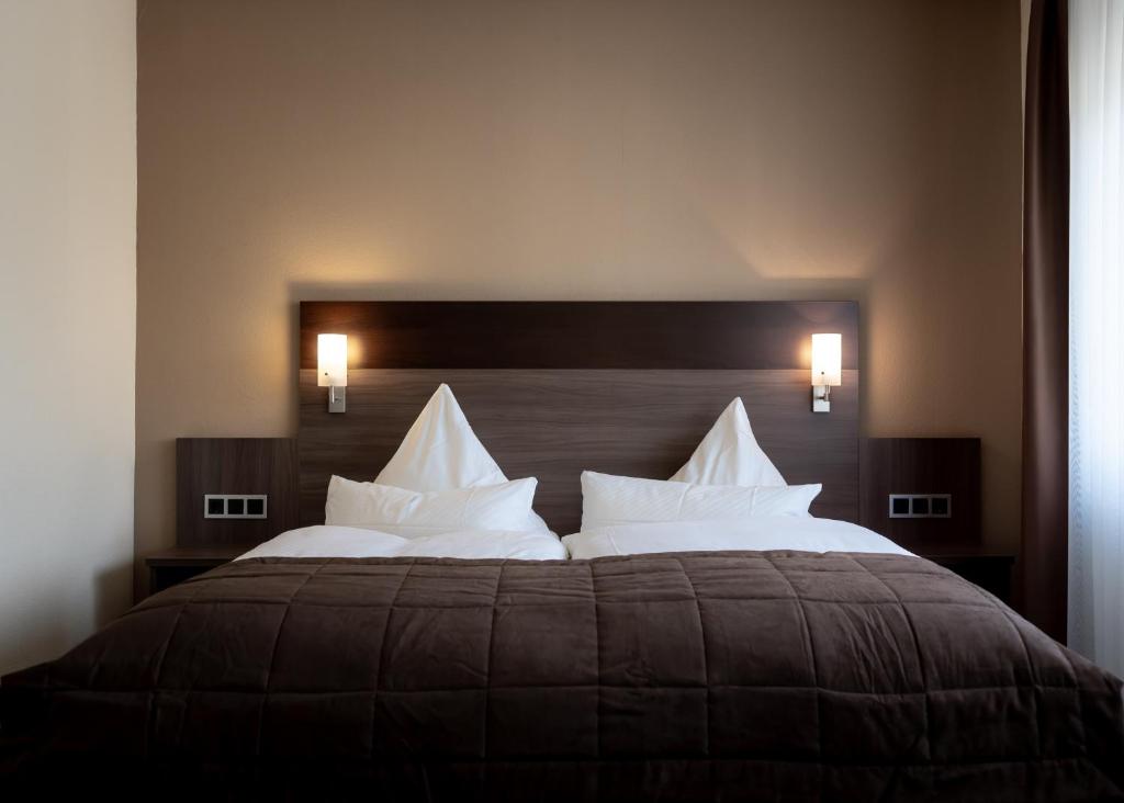 Cama o camas de una habitación en Hotel Germania