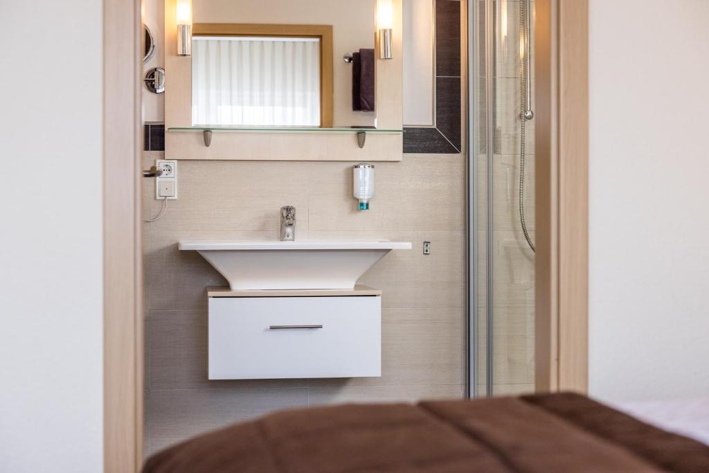 Koupelna v ubytování Hotel Germania