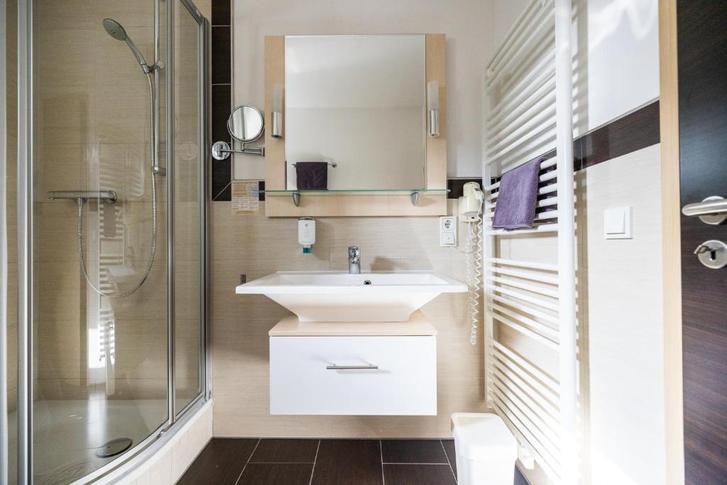 Koupelna v ubytování Hotel Germania