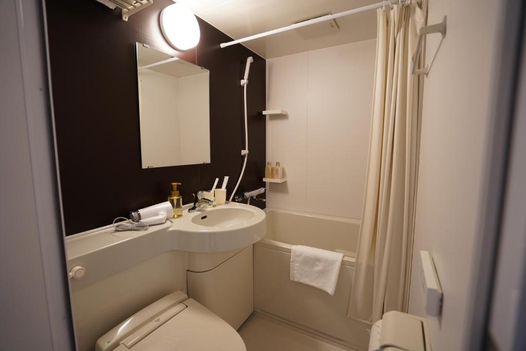 Koupelna v ubytování Plaza In Kanku Hotel