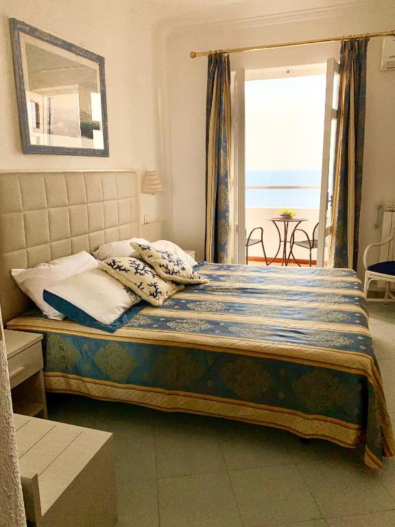 Cama o camas de una habitación en Hotel Grazia alla Scannella