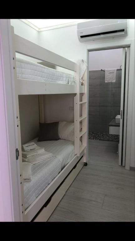 Postel nebo postele na pokoji v ubytování I Quattro Elementi