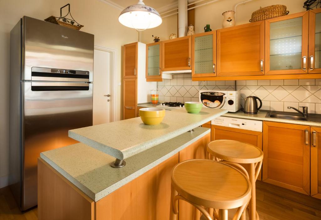 Kuchyňa alebo kuchynka v ubytovaní Honti Apartmanház