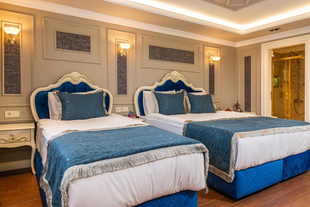 Begonville Mansion Oldcity - Chambre Triple De Luxe