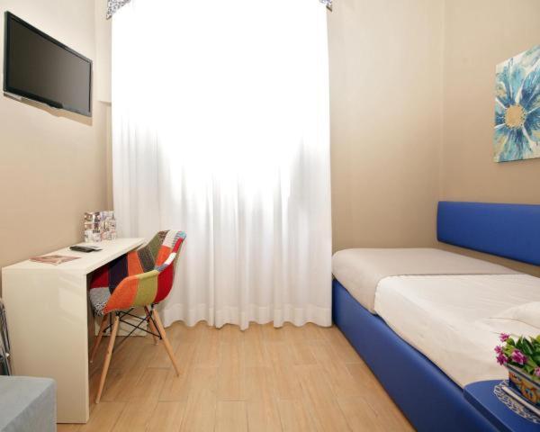 Postel nebo postele na pokoji v ubytování B&B Antonello da Messina
