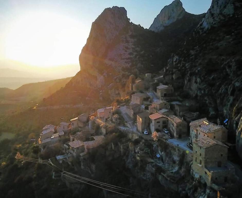 a village on the side of a mountain at Abella Climb Eco Refugio Permanent Closure in Abella de la Conca