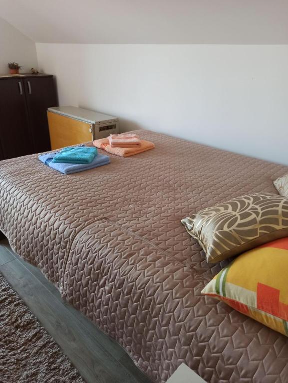 Postel nebo postele na pokoji v ubytování Apartman Vukan
