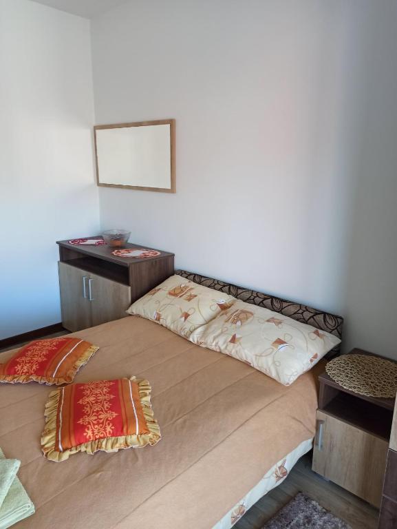 Postel nebo postele na pokoji v ubytování Apartman Vukan