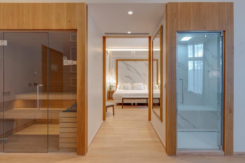 Posteľ alebo postele v izbe v ubytovaní Hotel Boutique Mirlo Barcelona