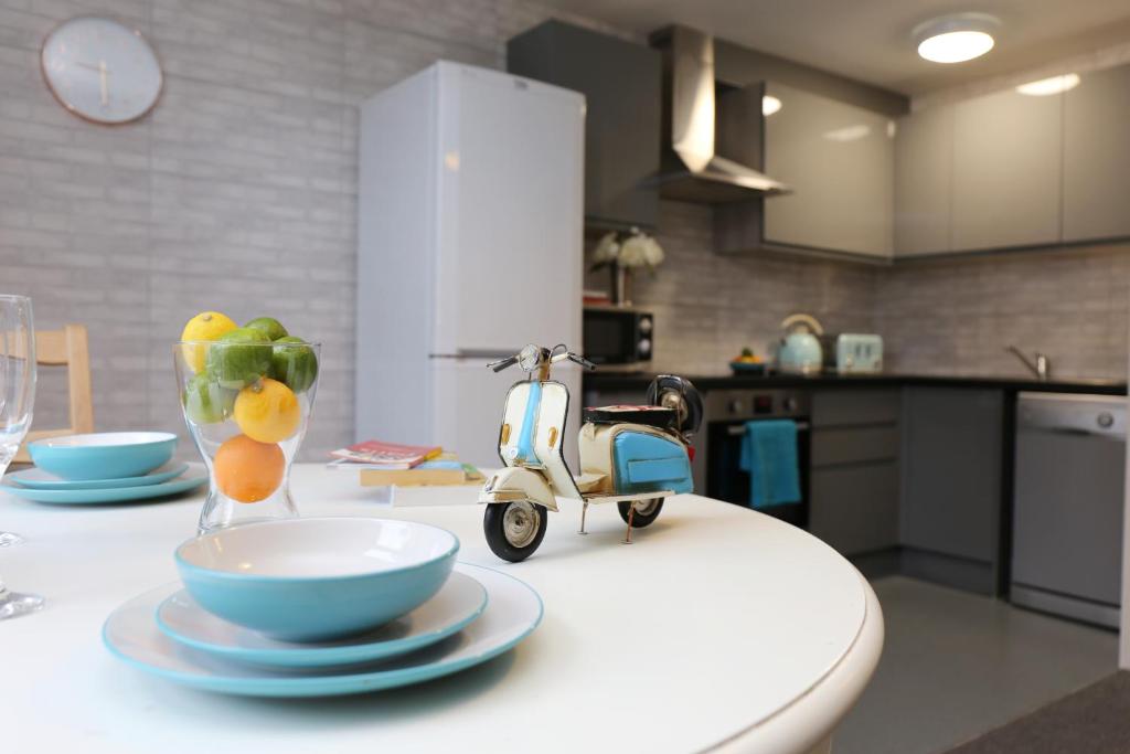 a small scooter sitting on a table in a kitchen at 80 Bedford Place in Southampton