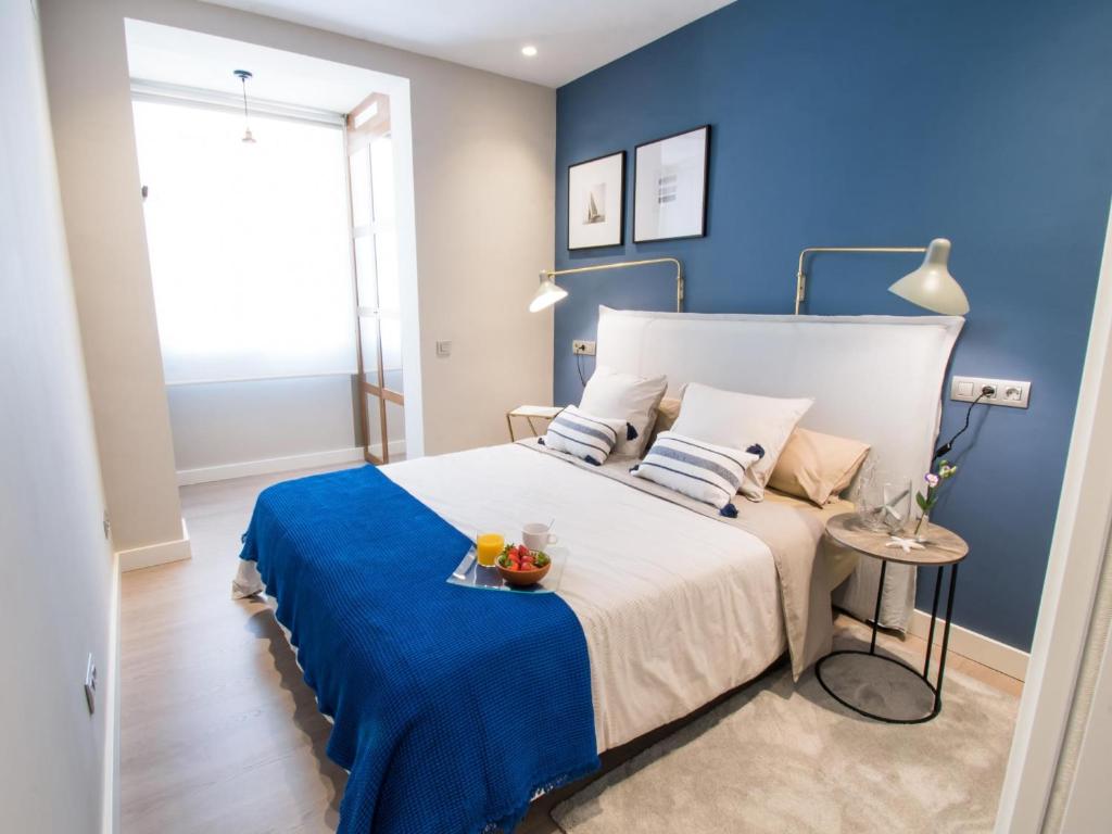 Postel nebo postele na pokoji v ubytování Sitges Spaces Seaside Beach Flat- 4 Bedroom, 2 Bathroom, Terrace, Near Beach