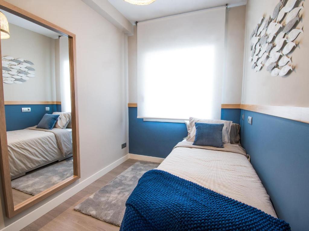 Postel nebo postele na pokoji v ubytování Sitges Spaces Seaside Beach Flat- 4 Bedroom, 2 Bathroom, Terrace, Near Beach