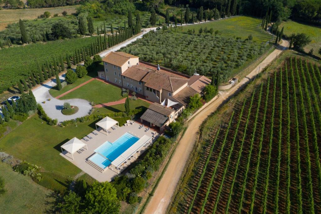 an aerial view of a house in a vineyard at Resort Casale Le Torri in Ponsacco