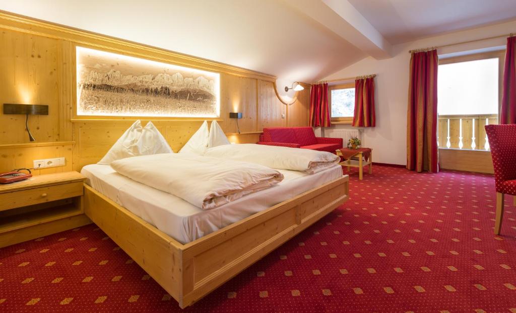 Postel nebo postele na pokoji v ubytování Aktiv Hotel Schönwald