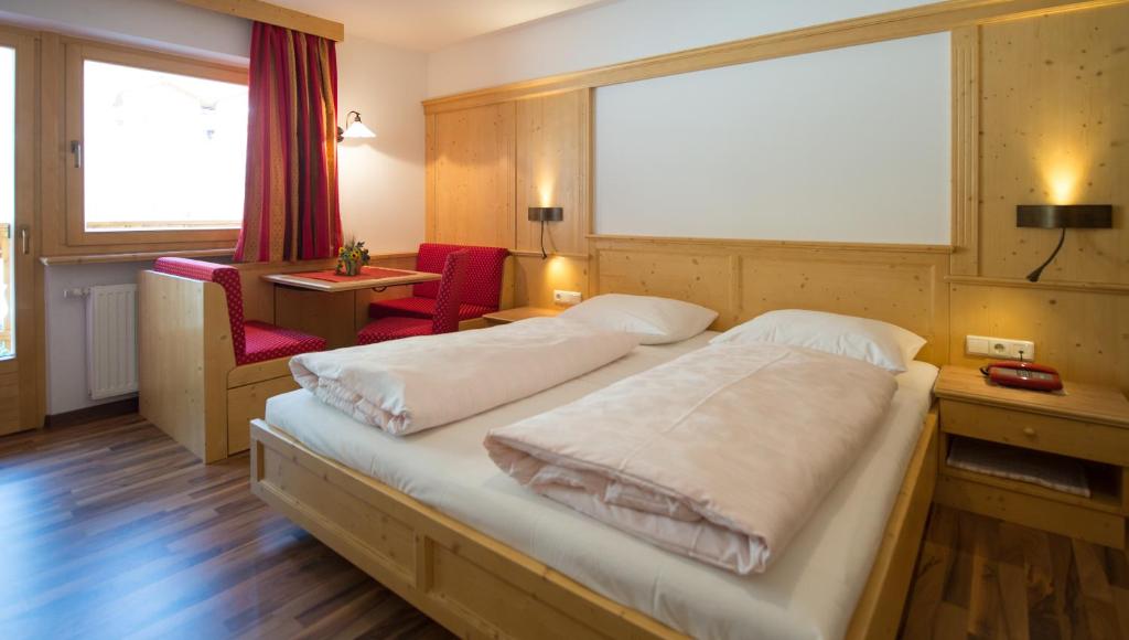 Postel nebo postele na pokoji v ubytování Aktiv Hotel Schönwald