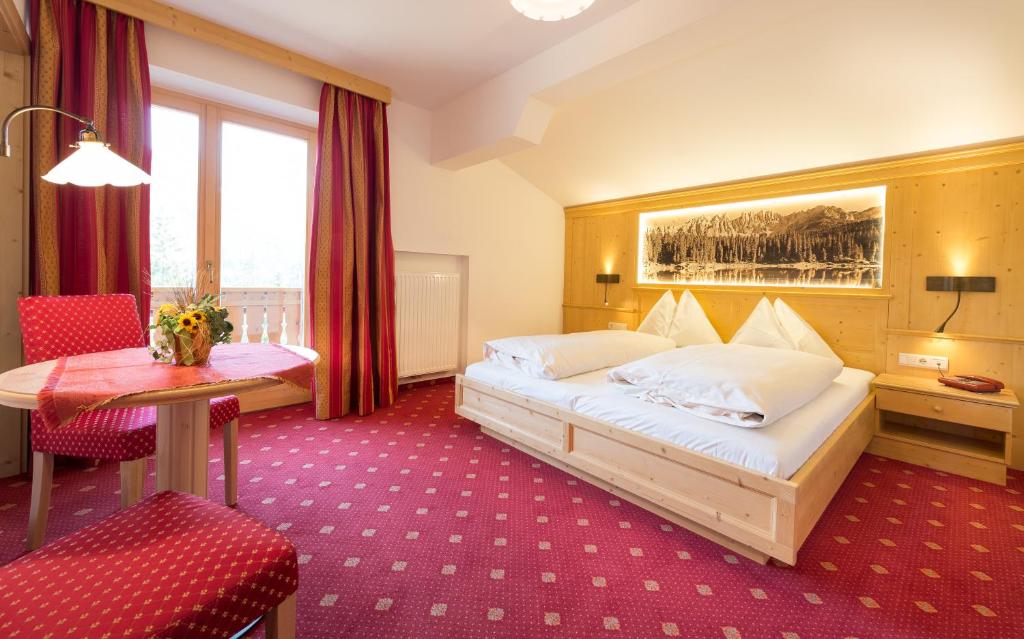 Postel nebo postele na pokoji v ubytování Aktiv Hotel Schönwald