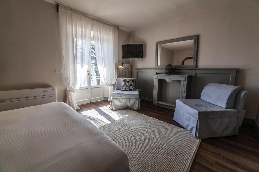 Posteľ alebo postele v izbe v ubytovaní Il Ciocco Hotels