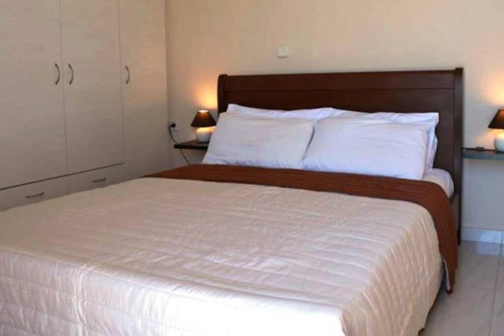 Posteľ alebo postele v izbe v ubytovaní Katerina's Apartment Makrigialos