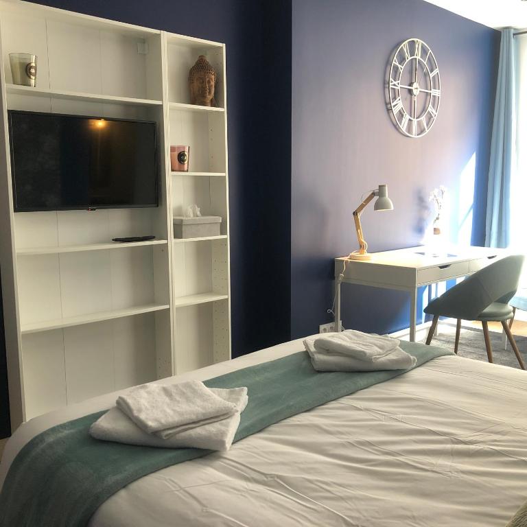 Postel nebo postele na pokoji v ubytování Hotel restaurant LA PLACE