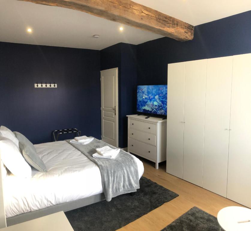 Postel nebo postele na pokoji v ubytování Hotel restaurant LA PLACE