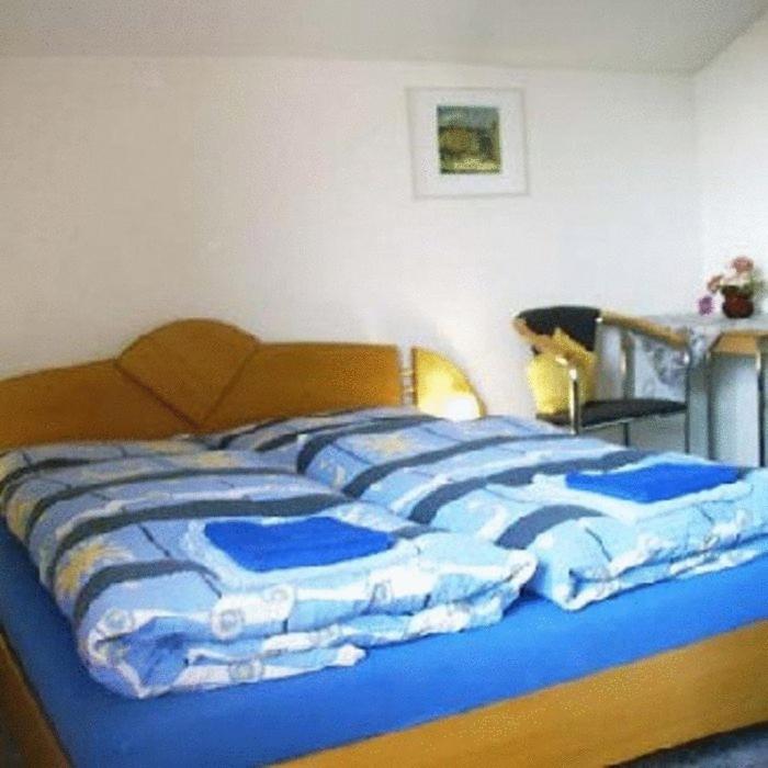 Posteľ alebo postele v izbe v ubytovaní Haus Stuttgart