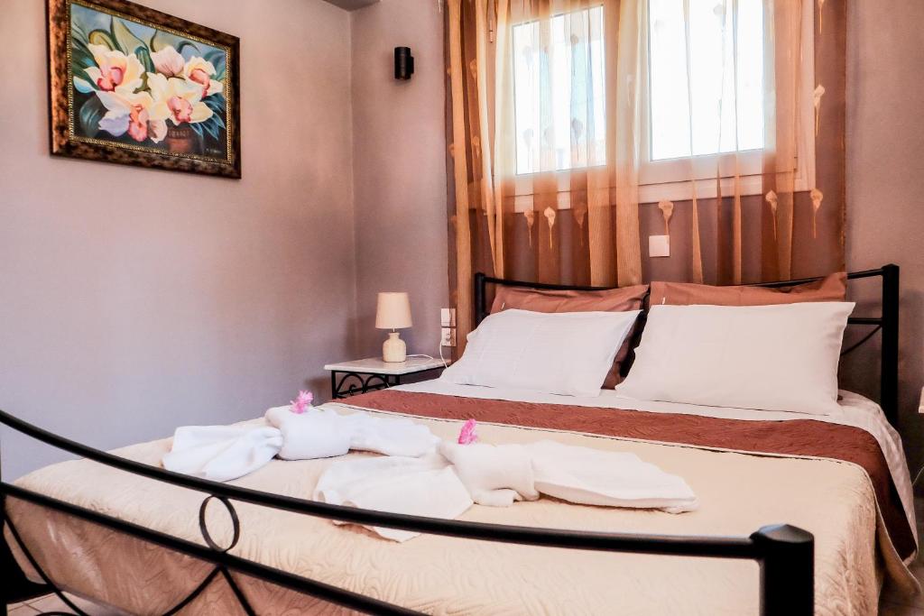 Łóżko lub łóżka w pokoju w obiekcie Villa DK