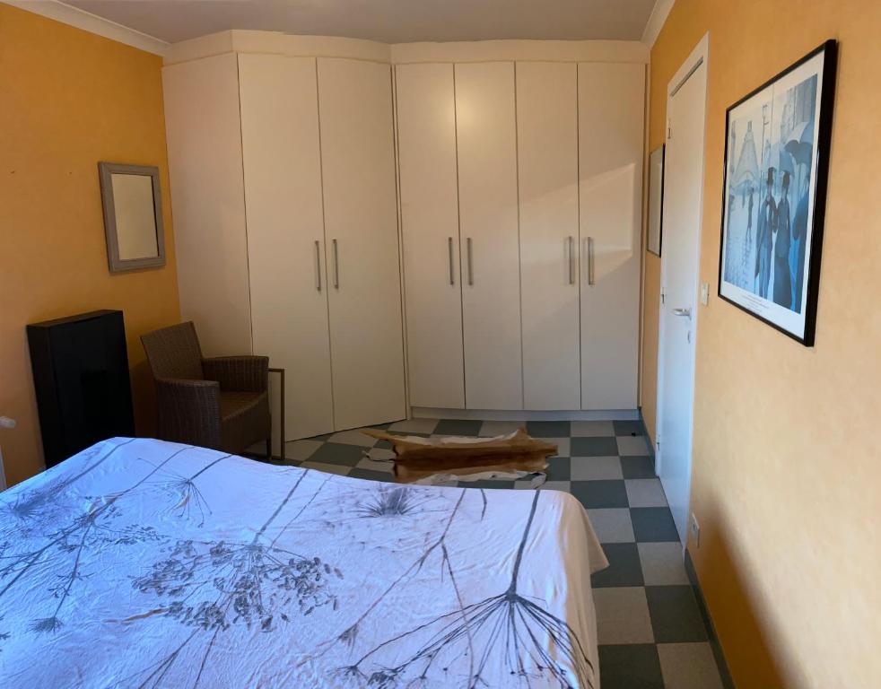 Postel nebo postele na pokoji v ubytování Vakantiewoning Jérôme