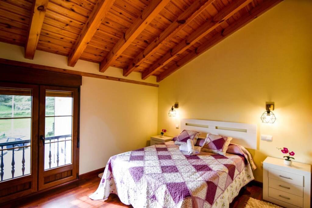 Postel nebo postele na pokoji v ubytování Precioso apartamento reformado en Liencres