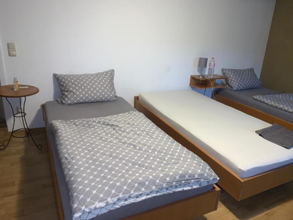 Postel nebo postele na pokoji v ubytování Hotel am Neumarkt