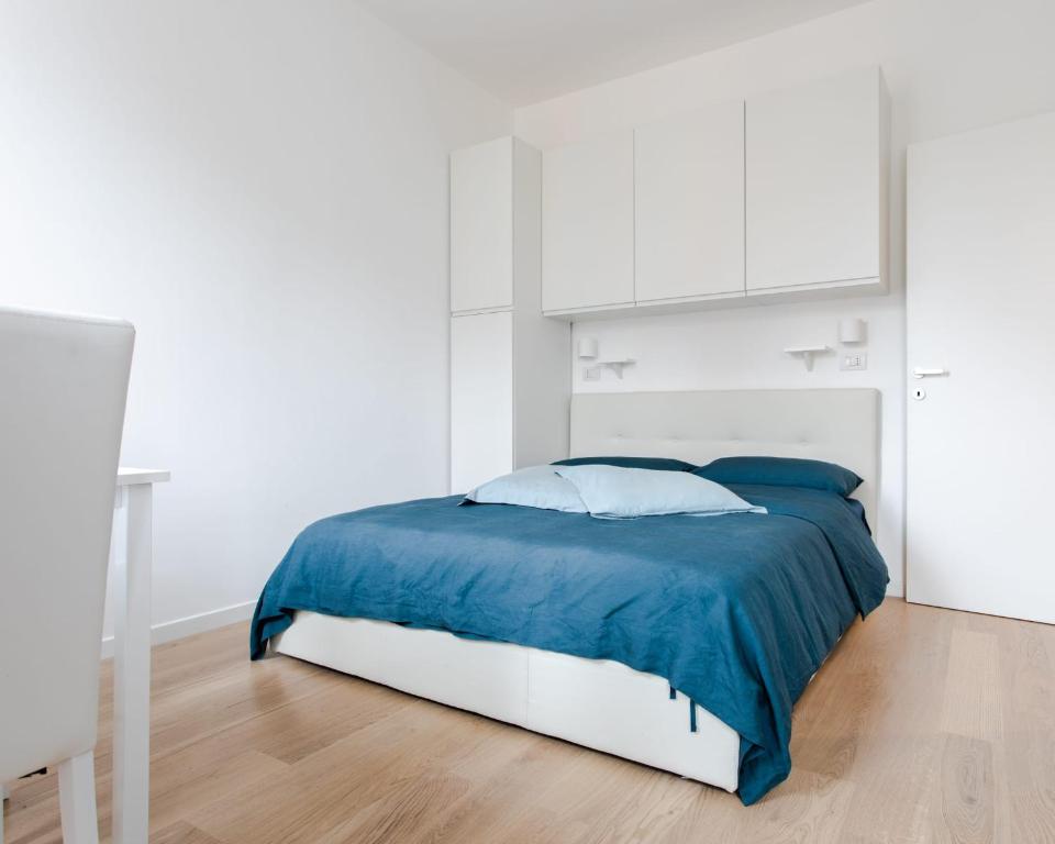 Łóżko lub łóżka w pokoju w obiekcie Al 32 Apartment