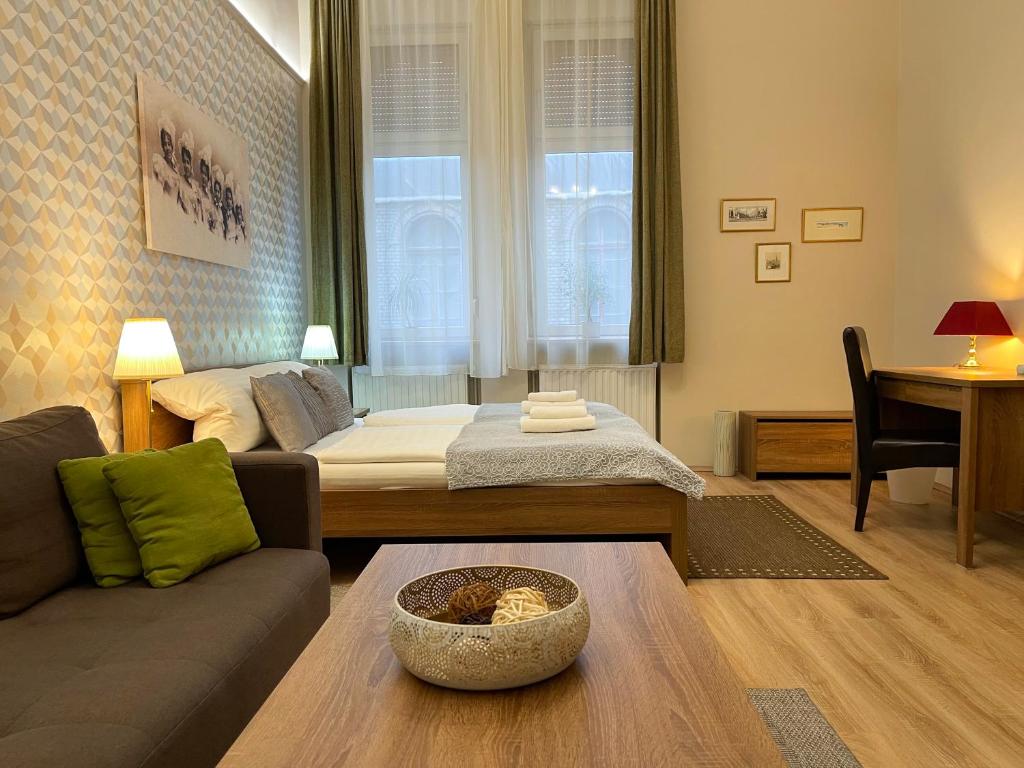 Posteľ alebo postele v izbe v ubytovaní ABT Apartments